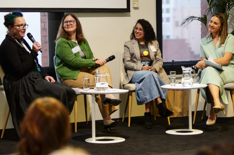 four-women-in-panel-discussion-on-stage
