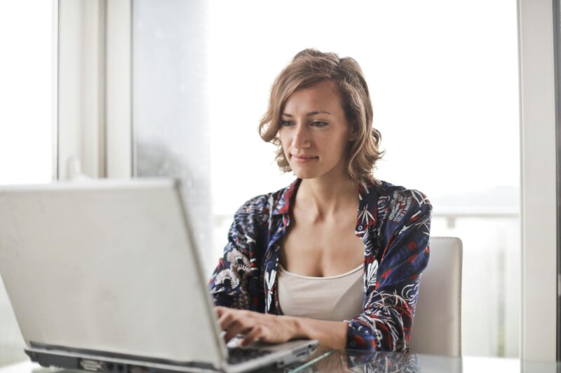 woman sitting at laptop